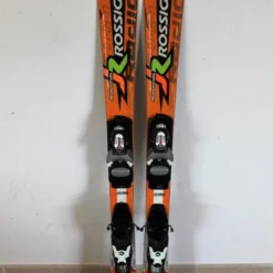 SKI D'OCCASION JUNIOR ROSSIGNOL RADICAL JR ORANGE + FIXATION COMP J